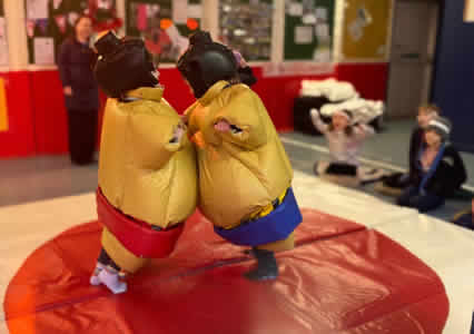 With belly buttons locked!